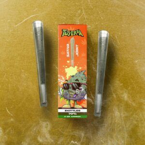 Dos preroll Zkittles NHC junto al frontal de la caja TuYerba